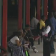 Parents and family members sit outside the Tri-Cities High School gym in East Point, Ga., on May 20, 2016, after they were told they couldn’t go in to watch their children graduate because of limited seating.
WSB-TV SCREENSHOT